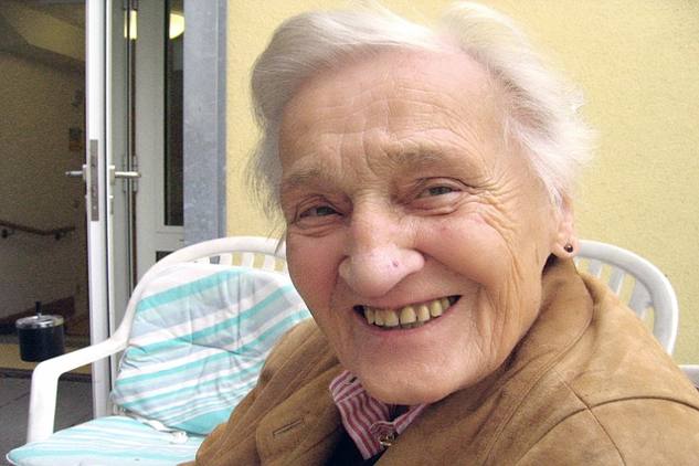 Healing Alzheimer's: Writing a New Page of Medical History an old woman smiling